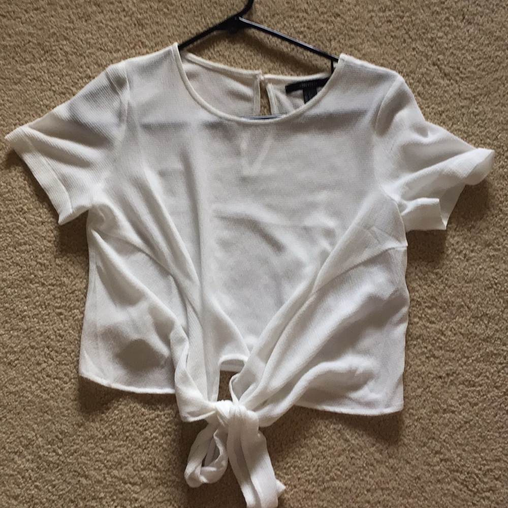 White blouse with front tie.